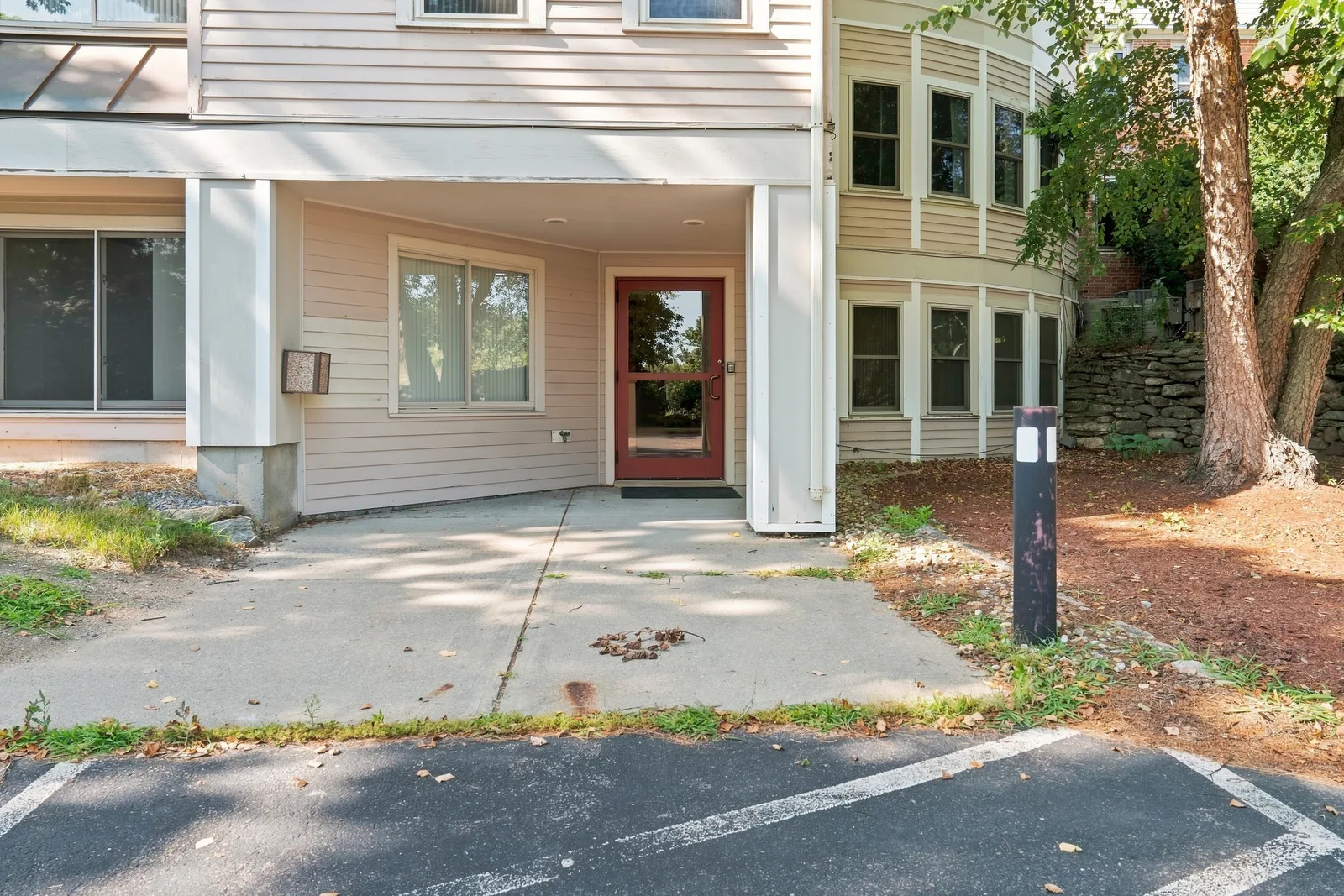 The lower entrance at Blanchard House with parking directly outside